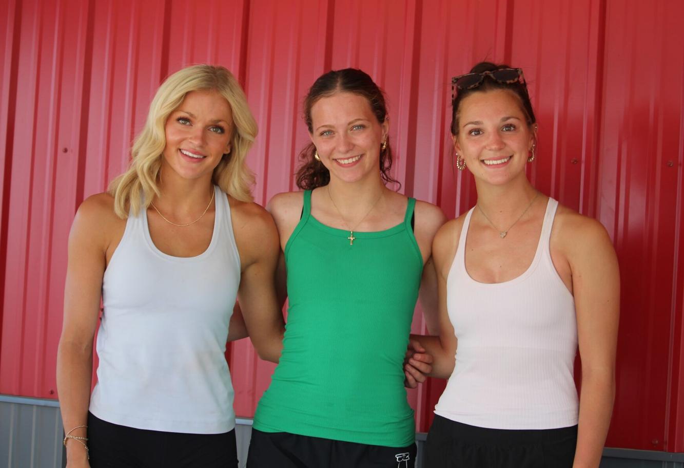 Westby Area High School athletes Katelyn Benish, Elizabeth Curtis and Madelyn VonFeldt — four-time state track qualifiers.