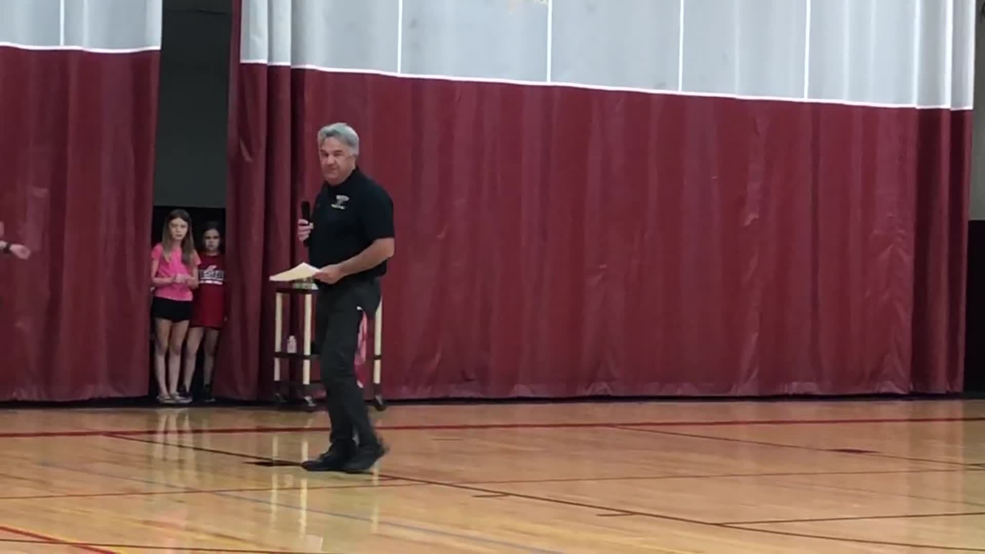 Coach Chris Yanske introduces state qualifiers at the Westby pep assembly